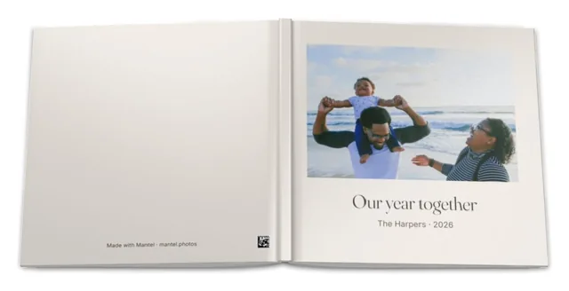 The book's whole cover laid flat: a plain back and the front with its photo and title